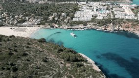 Aerial view Cala Romantica beach. Spain. Mallorca. Transparent water. Slow motion 4K