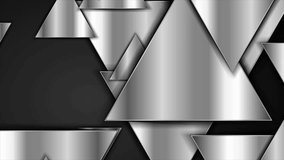 Silver metallic triangles abstract technology background. Seamless looping geometric motion design. Video animation Ultra HD 4K 3840x2160