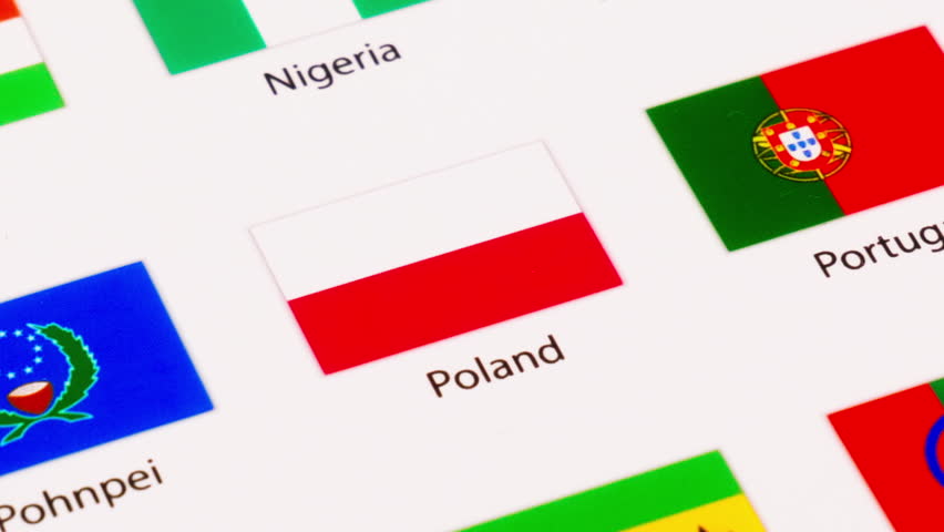 Zoom-out of a picture of the flags of different countries and territories from all over the world.