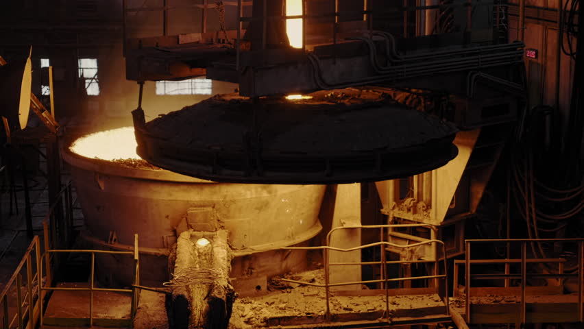 Iron foundry. Hot Workshop with rising smoke and burning fire at the metallurgical plant. Heavy industry. Industrial oven equipment at the steel factory. Heavy industry. Slow motion | Shutterstock HD Video #1110882035