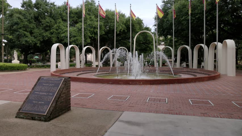 Spanish Park Plaza water fountain in Mobile, Alabama with gimbal video walking forward close up in slow motion.