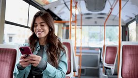 Happy young woman is using her mobile phone and enjoying the city - Powered by Shutterstock - Get 15% off with code: PIKWIZARD15