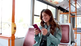 Happy young woman is using her mobile phone and enjoying the city - Powered by Shutterstock - Get 15% off with code: PIKWIZARD15