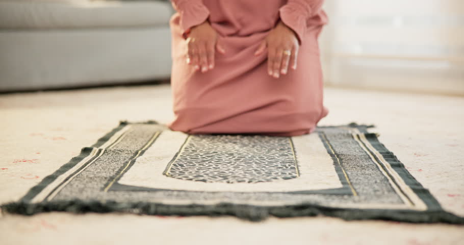 Muslim, bow or woman in prayer for Allah, wellness or spiritual awareness in home for gratitude. Salah, fasting or with Islamic person on floor or carpet for ramadan tradition, religion or worship Royalty-Free Stock Footage #1110912195