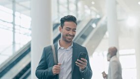Phone, happy and business man at airport lobby for social media, search app or email. Smile, smartphone and Asian professional with bag or luggage for travel, communication and consultant walking - Powered by Shutterstock - Get 15% off with code: PIKWIZARD15