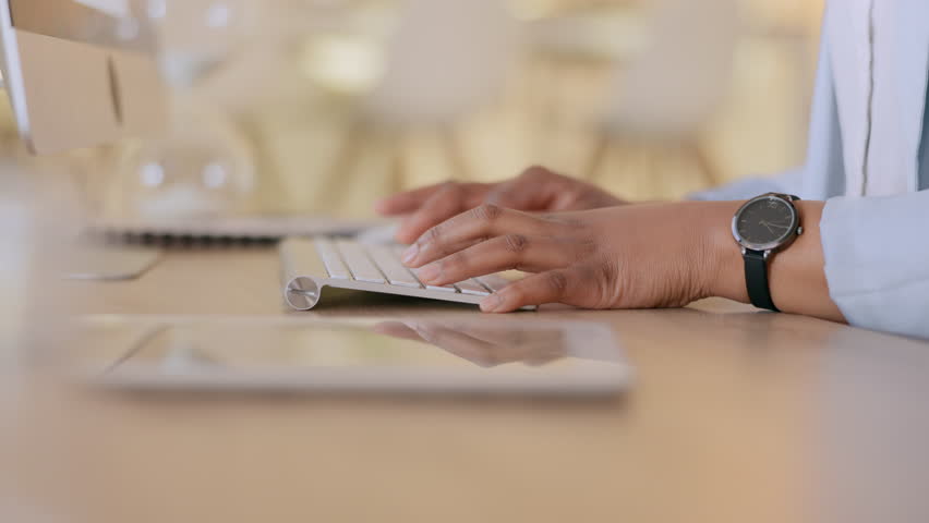 HR woman writing an email on a computer. Closeup of an administrator skilled in typing, sending important message to company network. Busy corporate worker working on an urgent internal communication Royalty-Free Stock Footage #1110917131
