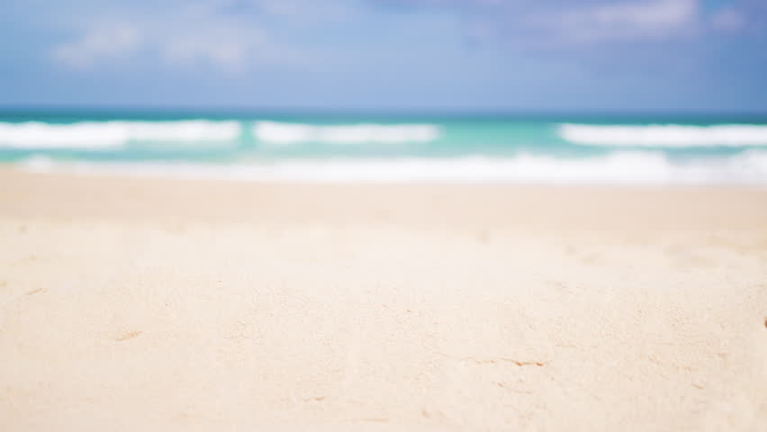 Beautiful sandy beach with blur sky summer background. Beach copy space or for product. Travel nature summer holiday vacation concept. 