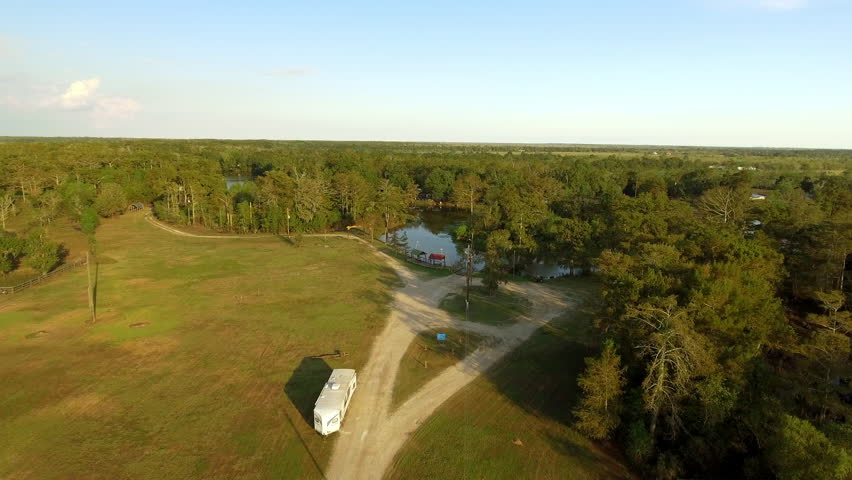 Aerial Scenic View Of River Stream, Drone Flying Forward Over Green Landscape - Bayou, Louisiana