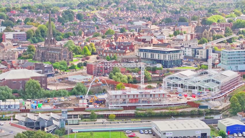 Cityscape Of Rotherham With Industrial Cranes On Constructing Sites In South Yorkshire, England. Aerial Drone Shot Royalty-Free Stock Footage #1110925665