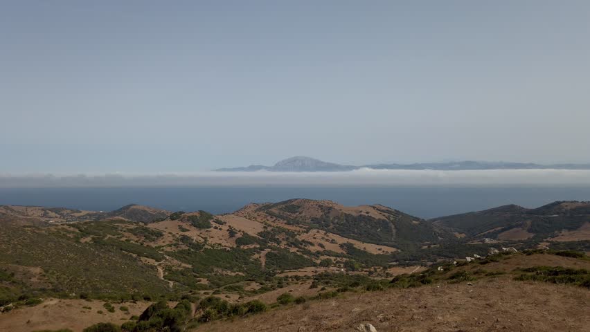The Narrow Strait Of Gibraltar Seen From El Mirador del Estrecho Near Tarifa, Cadiz, Andalusia, Spain. Wide Shot