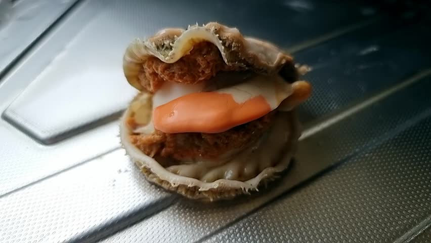 Freshly baked Bay scallop saltwater clam without it