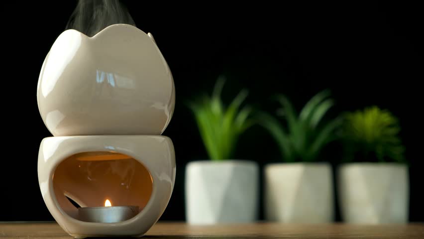 Oil burner aroma lamp, aromatic lamp with essential oils, aromatherapy and relax. Royalty-Free Stock Footage #1110934491
