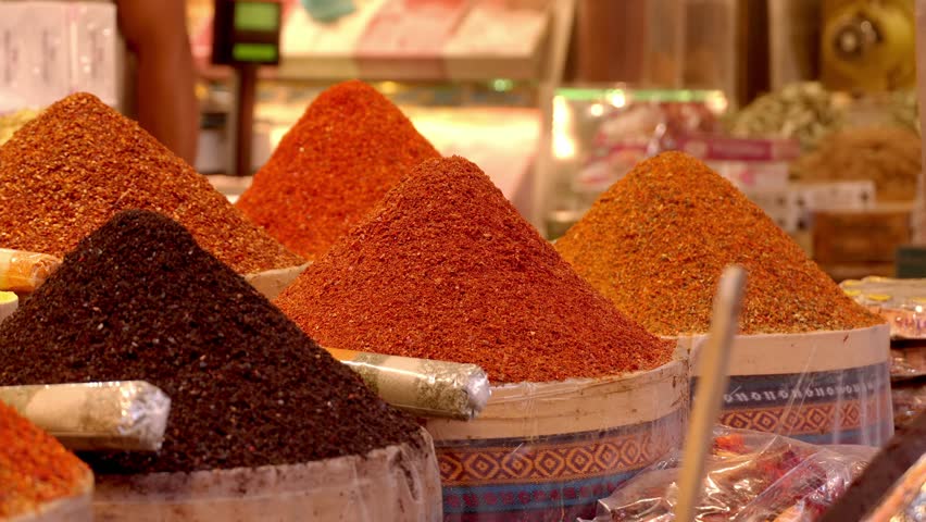 Arabic Spices in Market . Selective blurring on piles of spices of different colors and flavors used in Turkish cuisine in Istanbul Egyptian Spice Market, called in Turkey
