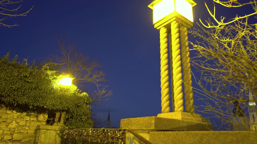 View of the old part of Zagreb with lighted Zagreb Cathedral as seen from upper part of town Gradec at night