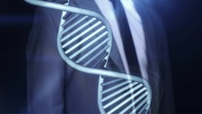 A man works on a virtual panel with the DNA structure. - Powered by Shutterstock - Get 15% off with code: PIKWIZARD15