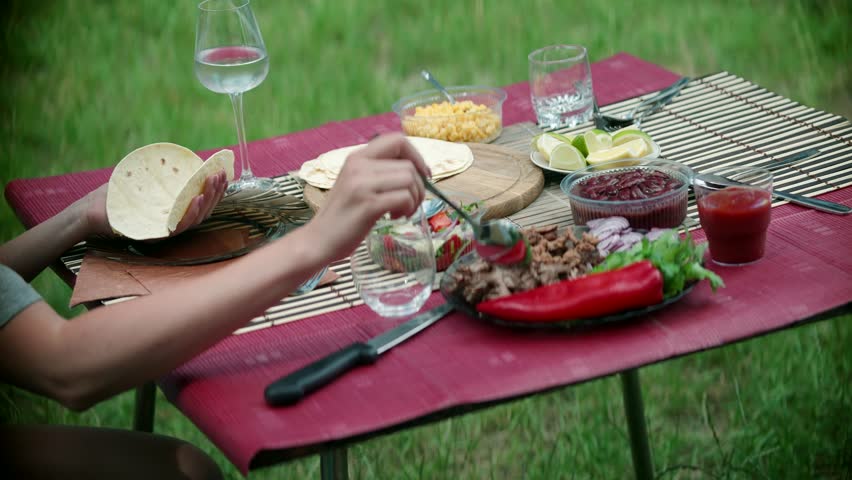 Tex mex Food. Traditional Mexican Pork Tacos. American Burrito Fajitas. Lime Juice Dripped On Delicious Mexican Tacos With Beef, Beans And Cilantro Salsa Corn Tortilla. Freshly Cooked Mexican Tacos