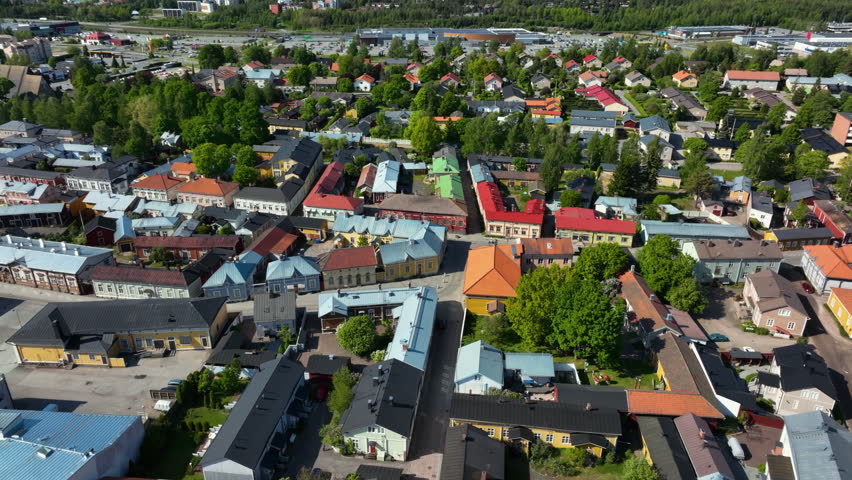 Aerial pan shot overlooking old architecture in downtown Rauma, in sunny Finland