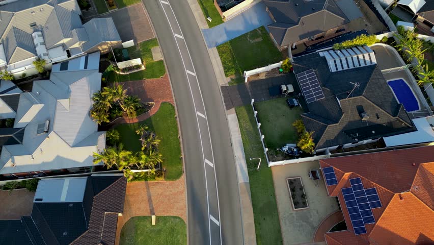 tilt up aerial view for real state of Lake Coogee Suburb in south Perth, big and luxury houses seeing from above in a greenery area. Western Australia