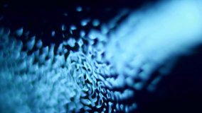 Vibrant effect liquid on surface water. Ripple and reflection aqua. Hypnotic wave on high speed video shot in blue background. Macro close up super slow motion 1000fps. Vibration liquid in blue color - Powered by Shutterstock - Get 15% off with code: PIKWIZARD15