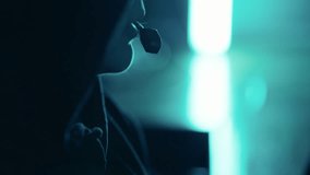 Close up hands of hacker typing keyboard computer in darkness. Hands of anonymous person typing on laptop keyboard at night. Hacker, Cyber security, Cyber crime concept - Powered by Shutterstock - Get 15% off with code: PIKWIZARD15