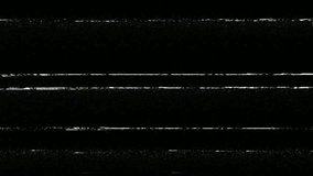VHS noise from an analog VCR video camcorder. The bad quality of the tape leads to visual effects typical for this type of vintage video camera. Perfect overlay footage to create a retro look.