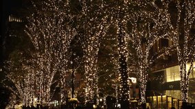 TOKYO, JAPAN - DECEMBER 2021 : Christmas tree illumination at Marunouchi area. Scenery of downtown city and street at night. Japanese winter and Christmas season concept video. - Powered by Shutterstock - Get 15% off with code: PIKWIZARD15