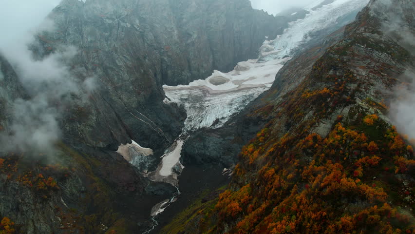 Top View On Glaciers Tongue In Mountains In Autumn Day, Unique Geological Features, Melting Old Ice Royalty-Free Stock Footage #1110984297