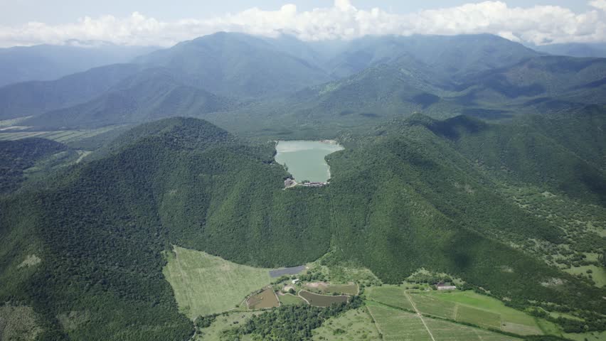 View from drone to Kvareli lake placed in mountains in Georgia