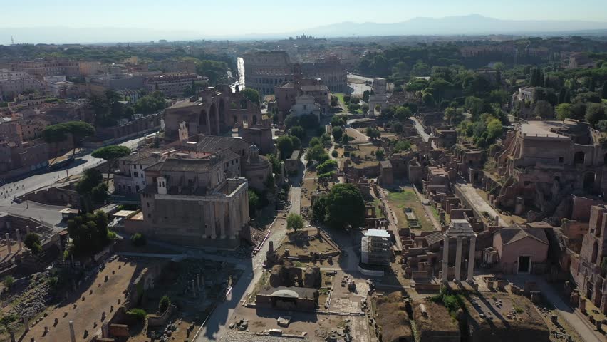 Flying over the ruins of ancient Rome and the Colosseum. Italy.
Aerial view of the Roman Forum. the most visited tourist area in the world. Royalty-Free Stock Footage #1111007083