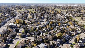 Aerial footage of Silverwood Heights, Saskatoon, SK, depicting the intricate layout of streets, homes, and parks. Ideal for real estate and city planning.