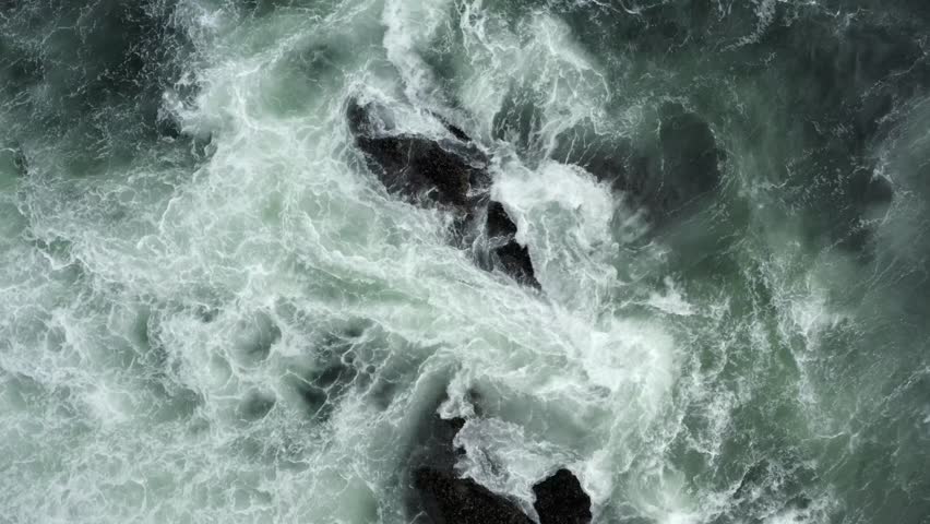 A View Of Crashing Waves On Outcrops During Stormy Weather. Aerial Shot