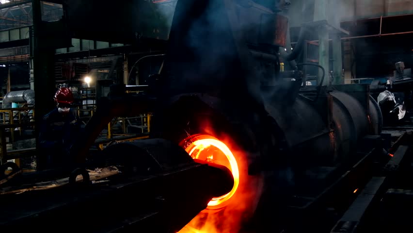 Iron pipe centrifugal pipe casting machine at the foundry Royalty-Free Stock Footage #1111041123