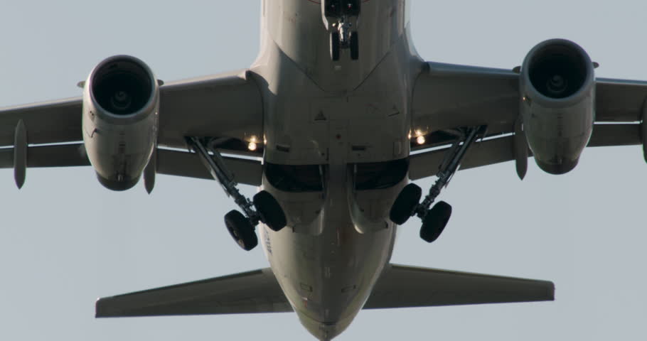 Jet Taking Off with Camera Following Landing Gear Retracting