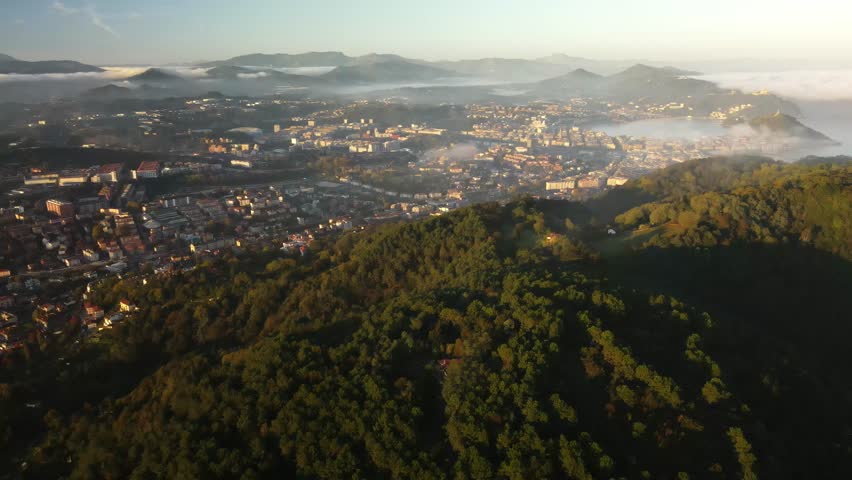 Sun cloud covered sky over hill mountains Donastia San Sebastian Spain