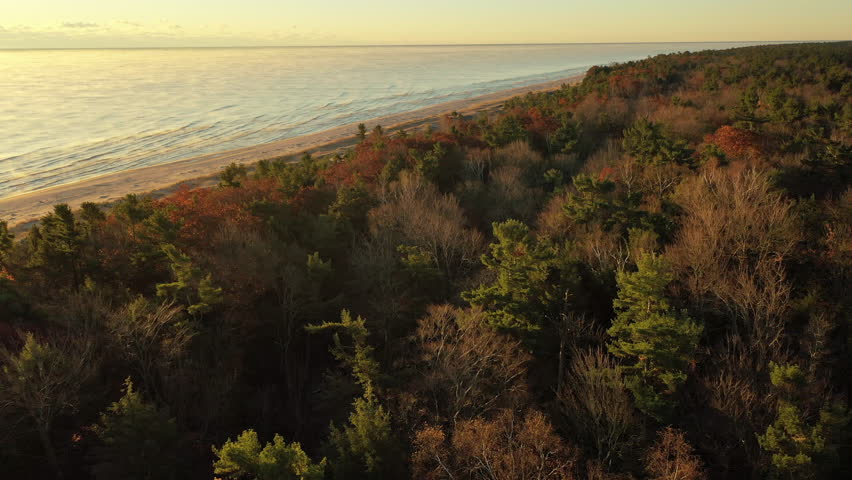 Aerial view of the Michigan Lake shoreline. The Great Lakes. Wisconsin, USA. Sunrise, golden hour