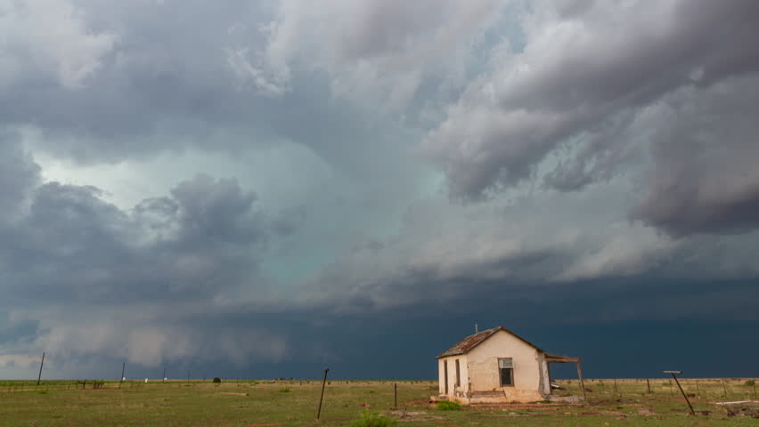 Shelf cloud approaches an abandoned house in New Mexico. Royalty-Free Stock Footage #1111054421