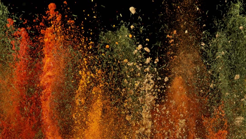 Super Slow Motion Shot of Colorful Explosion of Various Spices on Black Background at 1000fps.