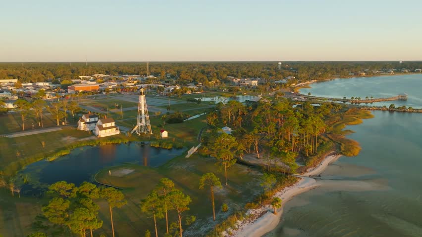 Drone approach of the Cape San Blas Lighthouse in Port St. Joe, Florida during sunset