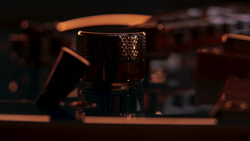 Extreme close up of guitar volume or tone knob or potentiometer. Pickup selector switch on foreground and humbucker pickup on background. Reflections move with camera movement, guitar rotating in shot Royalty-Free Stock Footage #1111059803