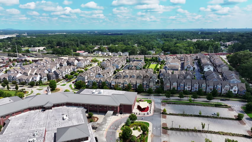 Forwards fly over residential complex of houses. High density rows of townhouses in urban neighborhood. Atlanta, Georgia, USA