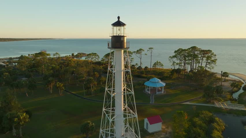 Slow aerial orbit of the Cape San Blas Lighthouse in Port St. Joe, Florida
