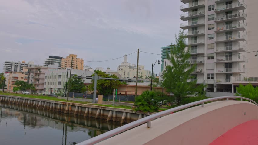 View of South Pointe Park Pier pedestrian bridge that spans bay, offering scenic view. Miami Beach. USA. | Shutterstock HD Video #1111064169