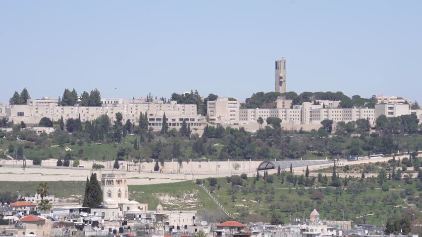The Hebrew university on mount Scopus overlooking the neighborhoods and olive groves of eastern Jerusalem Royalty-Free Stock Footage #1111067191