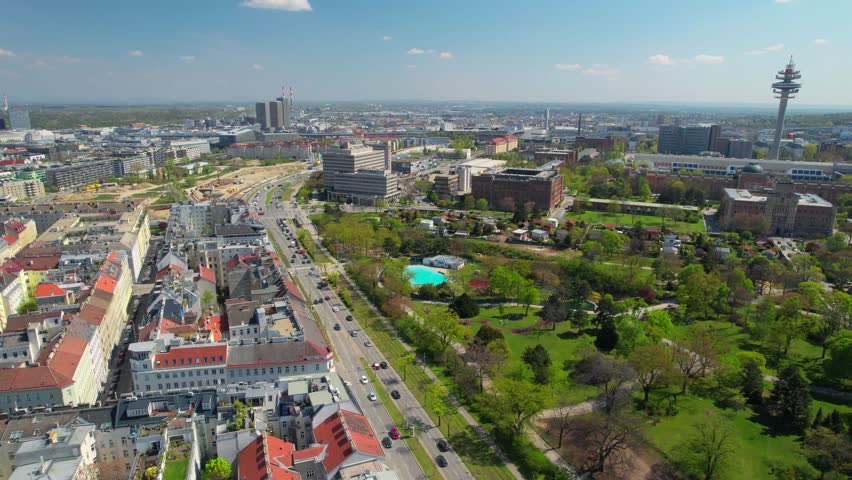 Aerial drone forward moving shot over Vienna skyline along city centre in Vienna downtown street view from above in Austria.