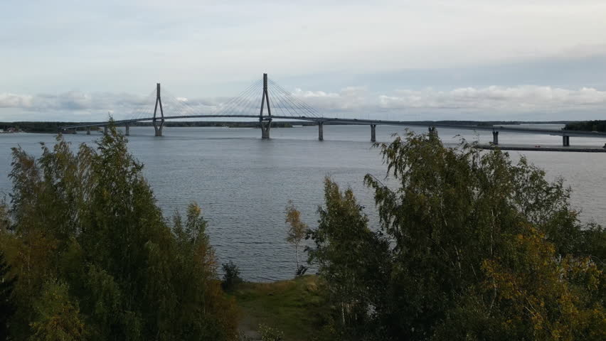 Dynamic establishing shot of Replot bridge, aerial panorama. Vaasa, Finland