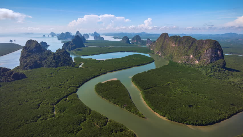 Hyperlapse aerial view drone flying over mangrove forest and mountain peak of Phang nga bay, Thailand
