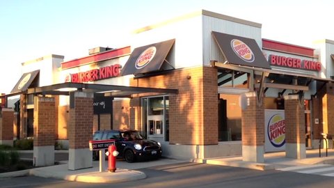 Port Coquitlam, BC, Canada - June 19, 2015 : One side of  Burger King drive thru and front door.  Burger King is a global chain of hamburger fast food restaurants.