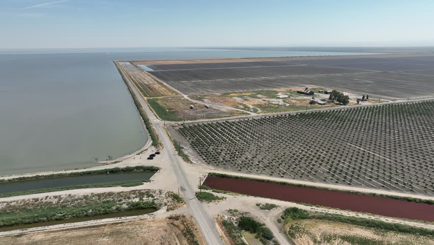 Tulare Lake Flood 2023 Irrigation Canal Aerial Shot Orbit R in San Joaquin Valley California USA