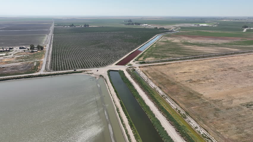 Tulare Lake Flood 2023 Canal Aerial Shot Forward in San Joaquin Valley California USA