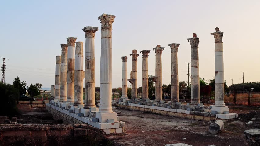 Roman Columns stand in Mersin, Turkey, remnants of ancient times. Sturdy Roman Columns against skies, a historic stance. Walk among Roman Columns, where past persists in present